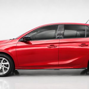 K163-003_2jpg - OPSHOLDERS Side view of a glossy red car showing doors, windows, and alloy wheels against a neutral background.