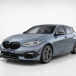 Blue BMW sedan in a studio setting, shown from a three-quarter front angle with glossy finish and prominent kidney grille (Motodrome design plate visible).