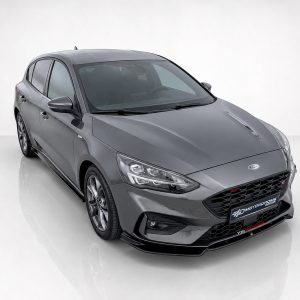 Three-quarter front view of a gray Ford hatchback with a sporty black grille in a white studio setting.