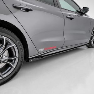 Ford Performance car side view focusing on rear wheel and lower body with red 'FORD PERFORMANCE' logo along the rocker panel
