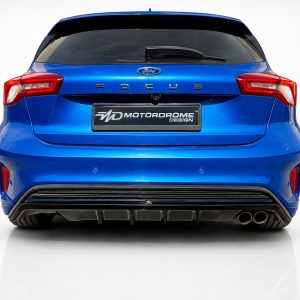 Blue Ford hatchback rear view with branding on the license plate area reading Motordrome Design.