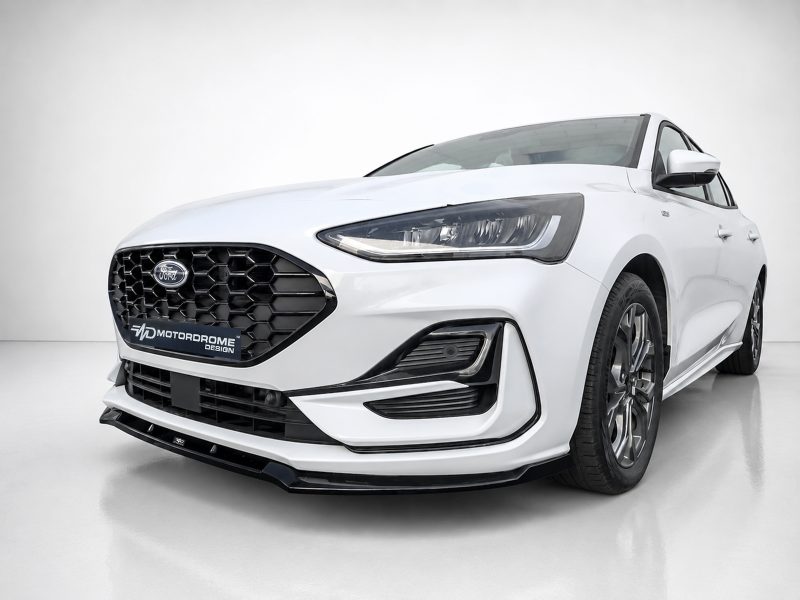 White Ford sedan shown from the front-left in a studio, featuring a black honeycomb grille and sharp LED headlights.