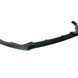 Black automotive front bumper lip spoiler with angular side fins, designed to improve aerodynamics.