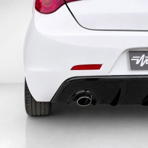 Rear view of a white car showing the exhaust tip, lower bumper, and red taillight.