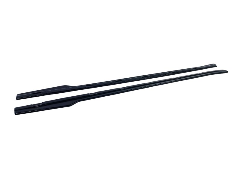 Pair of black windshield wiper blades laid parallel on a white background for a car maintenance product