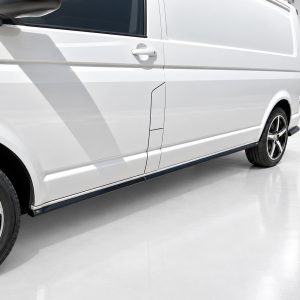 White cargo van shown from the side with black alloy wheels and clean, smooth body panels.