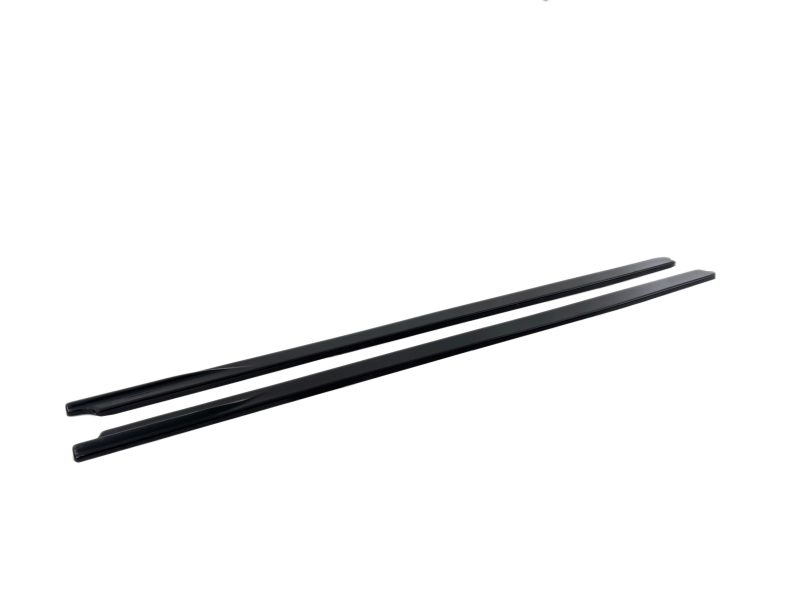 Two black windshield wiper blades laid parallel on a white background