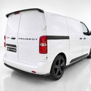 Rear three-quarter view of a white Peugeot Expert van with black trim and large black wheels.