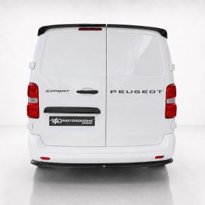 Rear view of a white Peugeot Expert van with brand badges and a Motordrome Design plate on the bumper area.