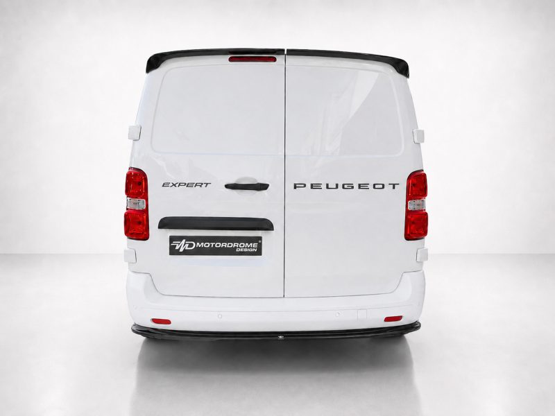 Rear view of a white Peugeot Expert van with brand badges and a Motordrome Design plate on the bumper area.