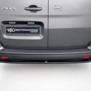 Rear view of a gray van with split doors, showing Zafira Life and Opel badges and a Motordrome Design plate above the bumper.