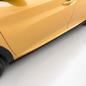 Side view of a yellow car door with black trim and alloy wheel visible at the bottom edge