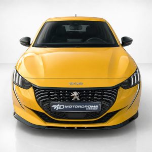 Front view of a yellow Peugeot 208 car in a studio setting.