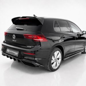 Black Volkswagen Golf eTSI station wagon viewed from rear-right in a white studio setting