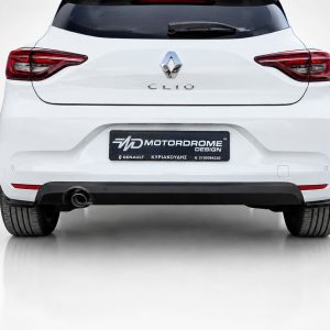 K175-004_2jpg - OPSHOLDERS Rear view of a white Renault Clio showing the hatch with red taillights and a Motordrome Design license plate area
