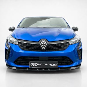 Front view of a blue Renault car in a studio setting with prominent grille and emblem.