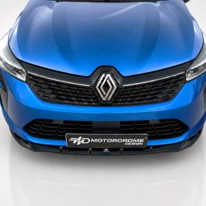 Front view of a blue Renault car showing its grille, emblem, and headlights on a neutral backdrop.