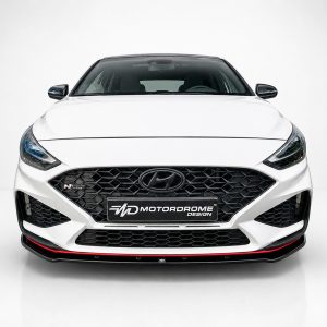 Front view of a white Hyundai with a large black hexagonal grille, angular headlights, and a red-accent lower lip.