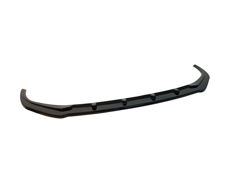 Glossy black aftermarket car spoiler lip with mounting points for rear aerodynamic enhancement.