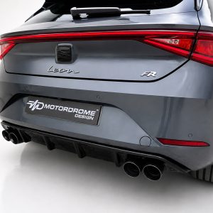 Rear view of a gray SEAT Leon FR hatchback showing the full taillight strip, badge, and quad exhausts