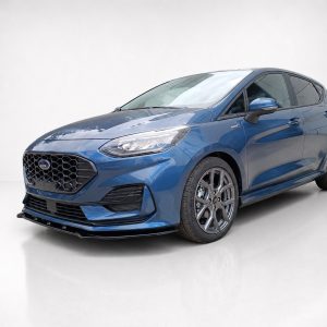 Blue Ford compact hatchback photographed in a bright studio, shown from the front-left with visible grille and alloy wheels in a glossy setting to highlight its design.