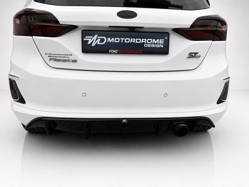 Rear view of a white Ford car with Fiesta badge on the left and ST-Line badge on the right, featuring a Motordrome Design plate in the center.
