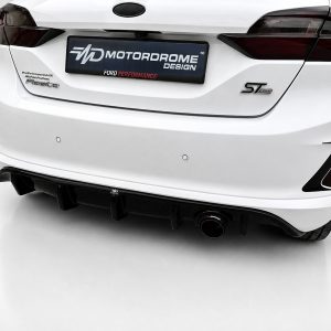 White Ford rear view showing ST-Line badge and a custom Motordrome Design plate in a showroom setting