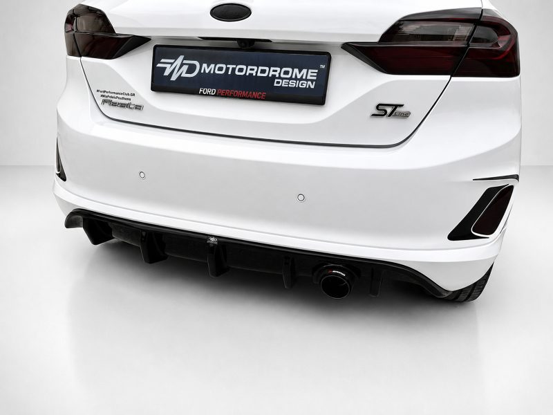 White Ford rear view showing ST-Line badge and a custom Motordrome Design plate in a showroom setting