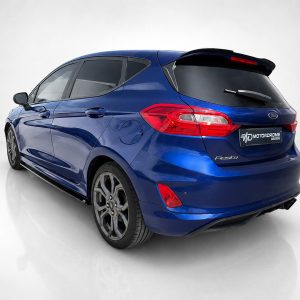 K182-005_3jpg - OPSHOLDERS Blue Ford Fiesta hatchback viewed from the rear-left in a white studio setting