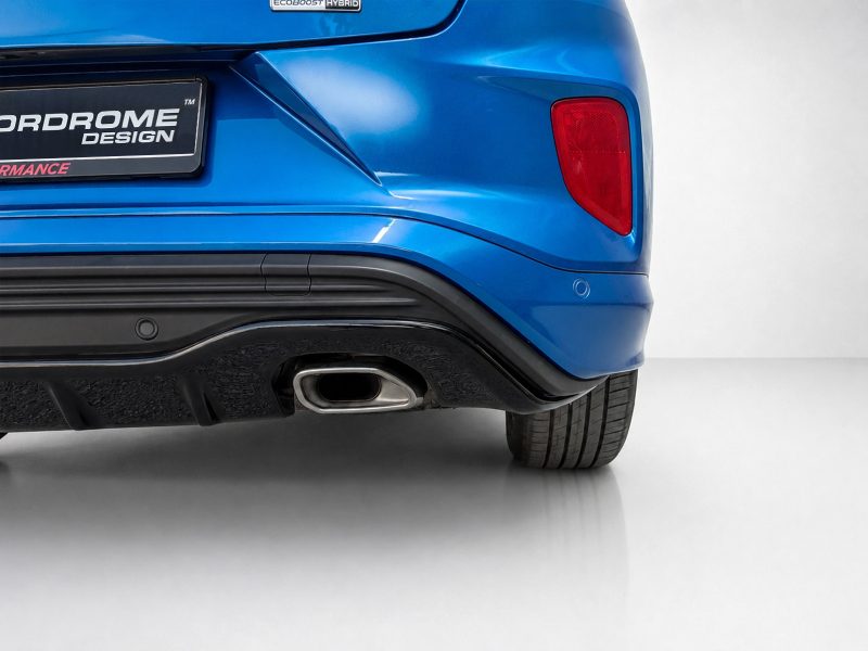 Blue rear view of a car with a red taillight on the right, chrome exhaust, and a dark license plate area reading 'ORDROME DESIGN' (gordrome).