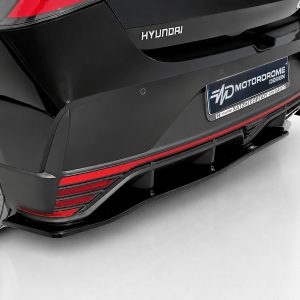 K185-003_3jpg - OPSHOLDERS Rear of a black Hyundai with red accents, showing a performance diffuser and taillights on a clean studio setup.