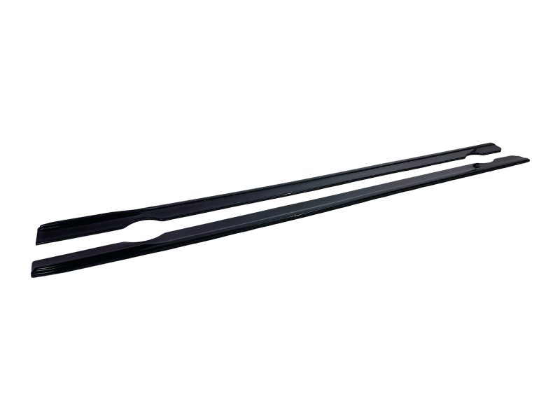 Pair of black windshield wiper blades laid diagonally side by side on a white background.