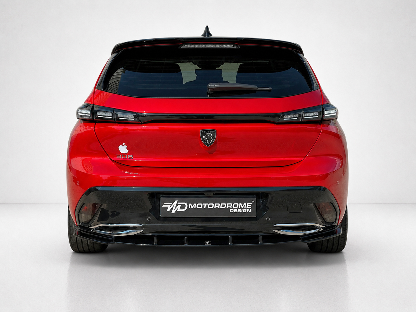 K189-003_1jpg - OPSHOLDERS Rear view of a red Peugeot 308 hatchback in a studio, showing the tail lights, badge, and a dyed license plate reading 'MD Motorodrome Design'
