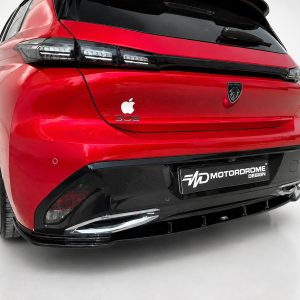 K189-003_3jpg - OPSHOLDERS Rear view of a red Peugeot 308 hatchback with black bumper accents and a MOTORDROME DESIGN plate in a studio setting