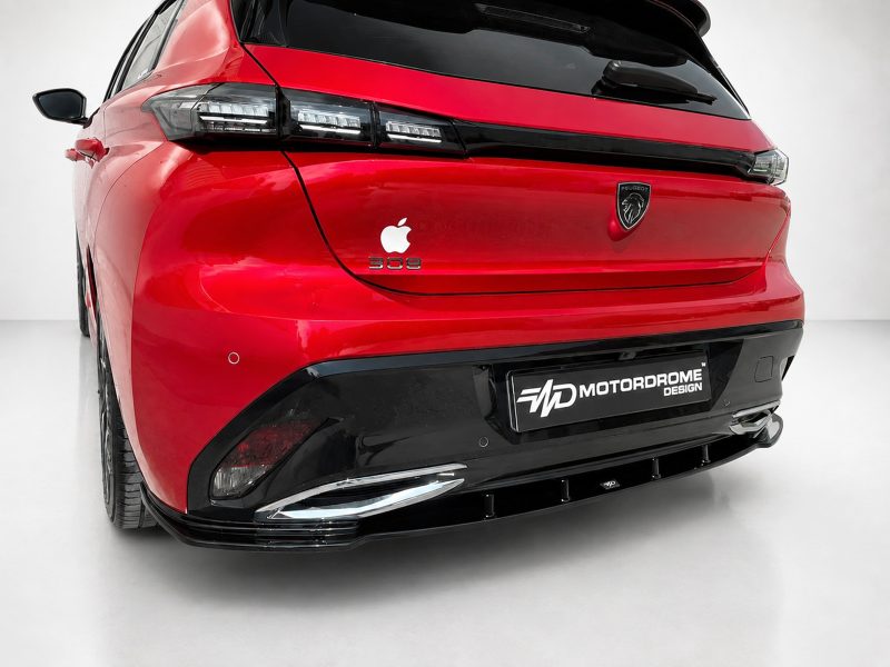 K189-003_3jpg - OPSHOLDERS Rear view of a red Peugeot 308 hatchback with black bumper accents and a MOTORDROME DESIGN plate in a studio setting
