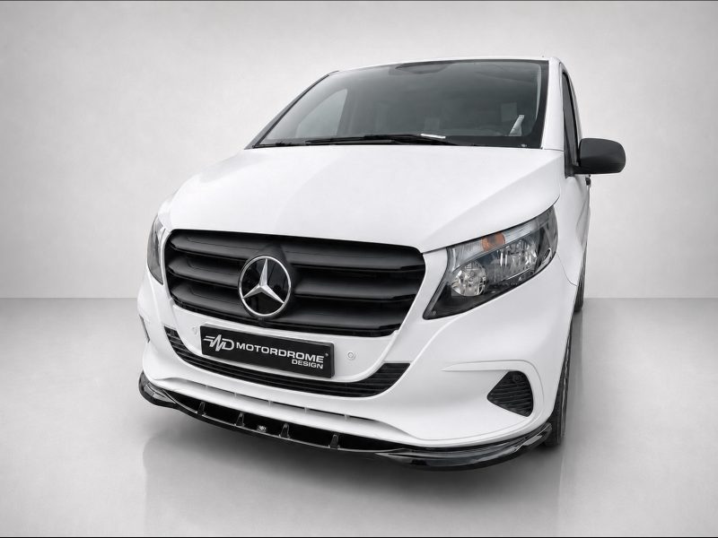 K190-002_3jpg - OPSHOLDERS White Mercedes van front view in a studio setting, showing grille and emblem clearly