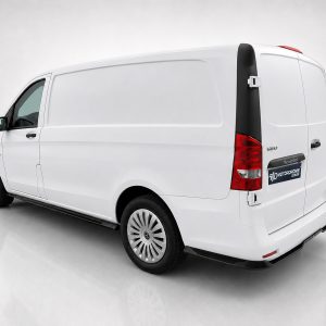 White cargo van shown from rear-left in a studio setting, highlighting its blank side panel and rear doors with red tail lights.