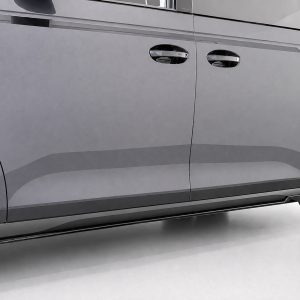 Close-up side view of a gray van showing two sliding-door handles, lower body running board, and a visible tire.