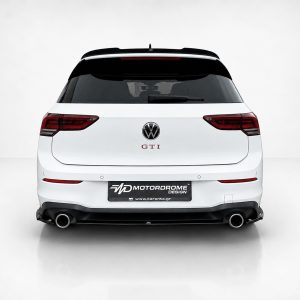 Rear view of a white VW GTI hatchback with dark taillights and a custom Motordrome Design license plate area.