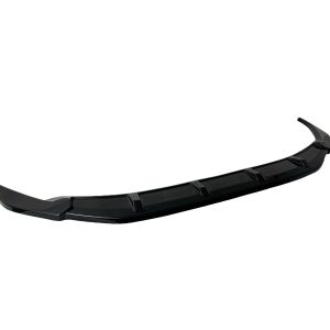 Black automotive front lip spoiler with angular fins, designed to mount to a vehicle’s bumper for aerodynamics and downforce.