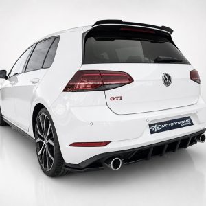 Rear view of a white Volkswagen GTI hatchback featuring a sporty black diffuser and dual exhausts, with a Motordrome Design plate visible on the bumper.