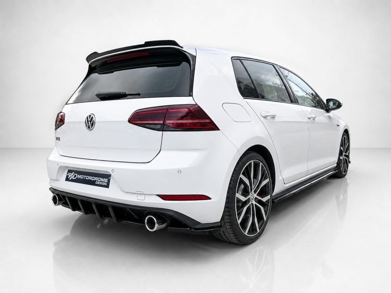 K196-004_4jpg - OPSHOLDERS Rear three-quarter view of a white modified VW hatchback in a studio, showing a rear diffuser, dual exhausts, and large wheels
