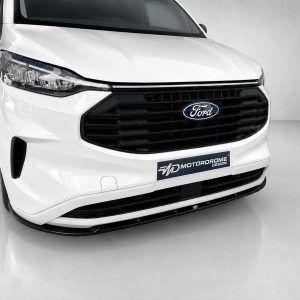 Front view of a white Ford van with a black grille and MotorDrome Design plate on the bumper
