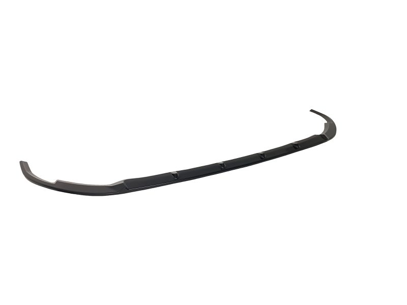 Long black curved car bumper lip with mounting tabs for installation on a vehicle's front or rear bumper component