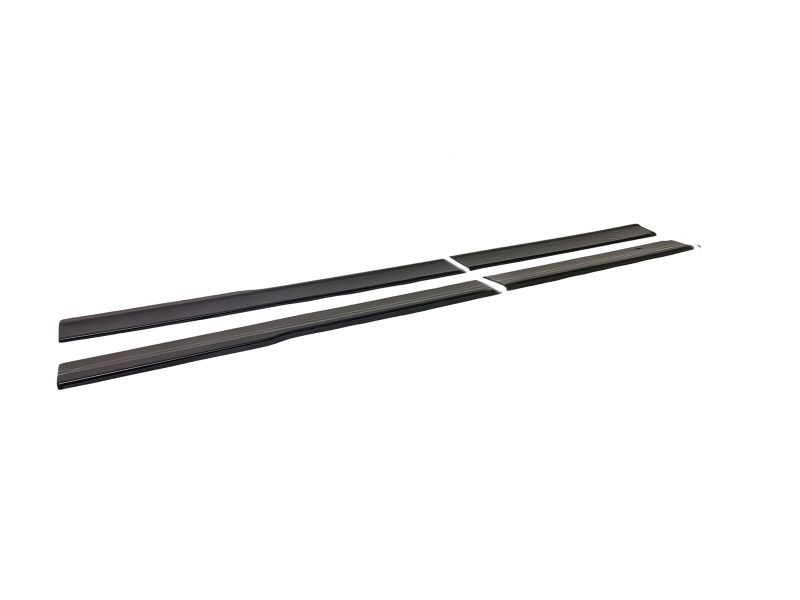 Pair of black windshield wiper blades laid parallel for a car exterior use.