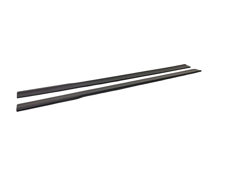 Pair of dark gray windshield wiper blades lying parallel on a white background
