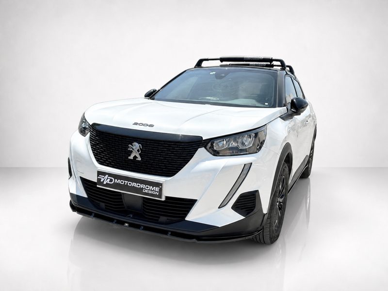 Angled front view of a white Peugeot SUV with a black grille and roof rack in a studio setting