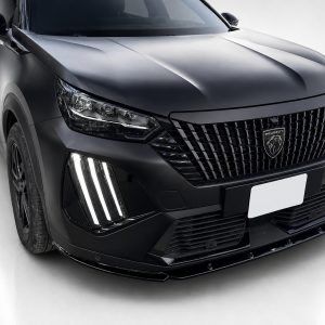 Front view of a matte black Peugeot SUV showing a bold grille, sharp headlights, and vertical LED daytime running lights.