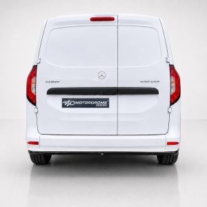 K204-003_3jpg - OPSHOLDERS Rear view of a white Mercedes van with split rear doors and red taillights, featuring an MD Motordrome Design plate on the back.