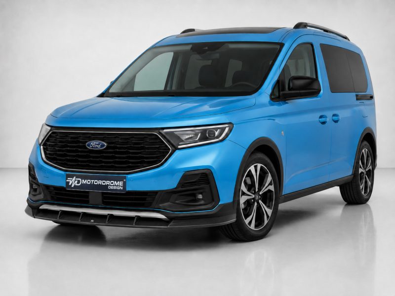 Blue Ford van shown from a three-quarter front view in a studio setting, highlighting the bold grille and headlights.